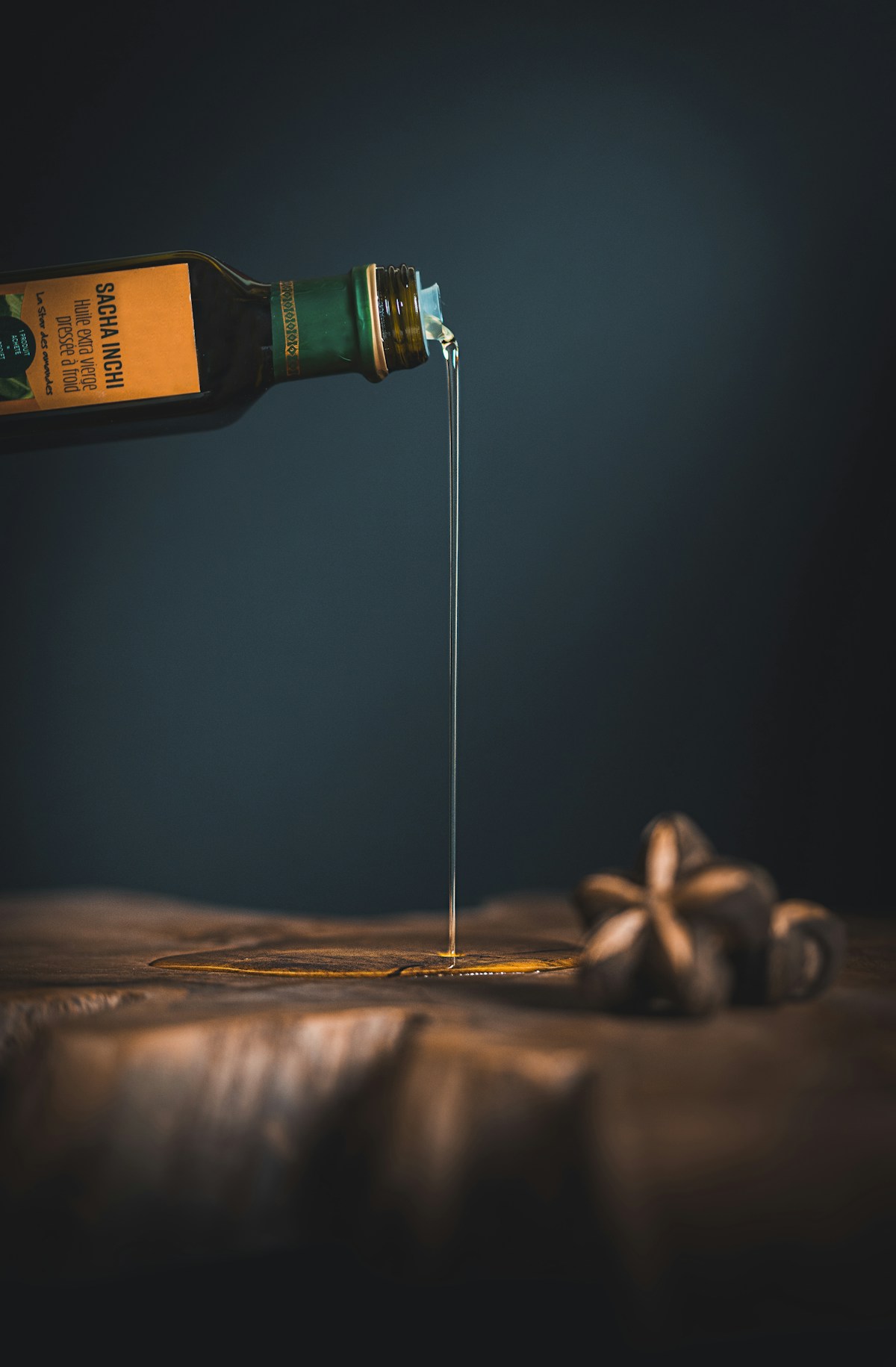 Golden olive oil poured over a plate of zaatar
